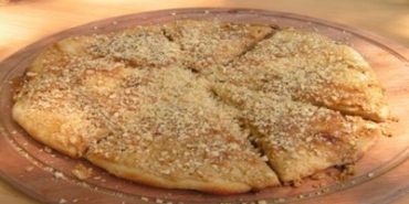 tahinli-pide-tanimi-bursa-yoresine-iliskin-tahinli-pide-nasil-yapilir-cneqpqpL.jpg